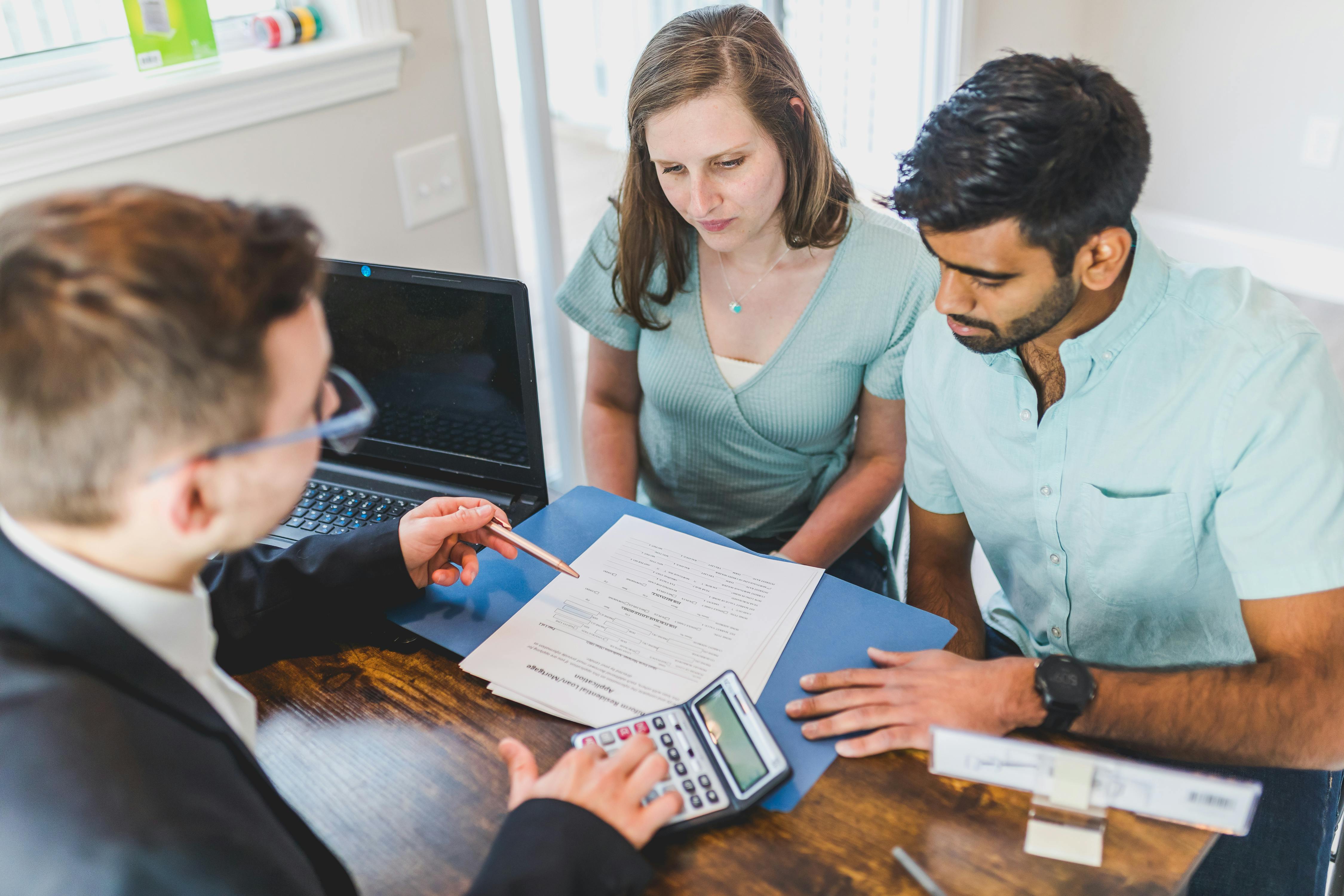 Couple reviewing mortgage documents